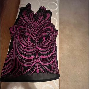 GENTLY USED in a smoke free home. NO DAMAGE. Sleeveless blouse